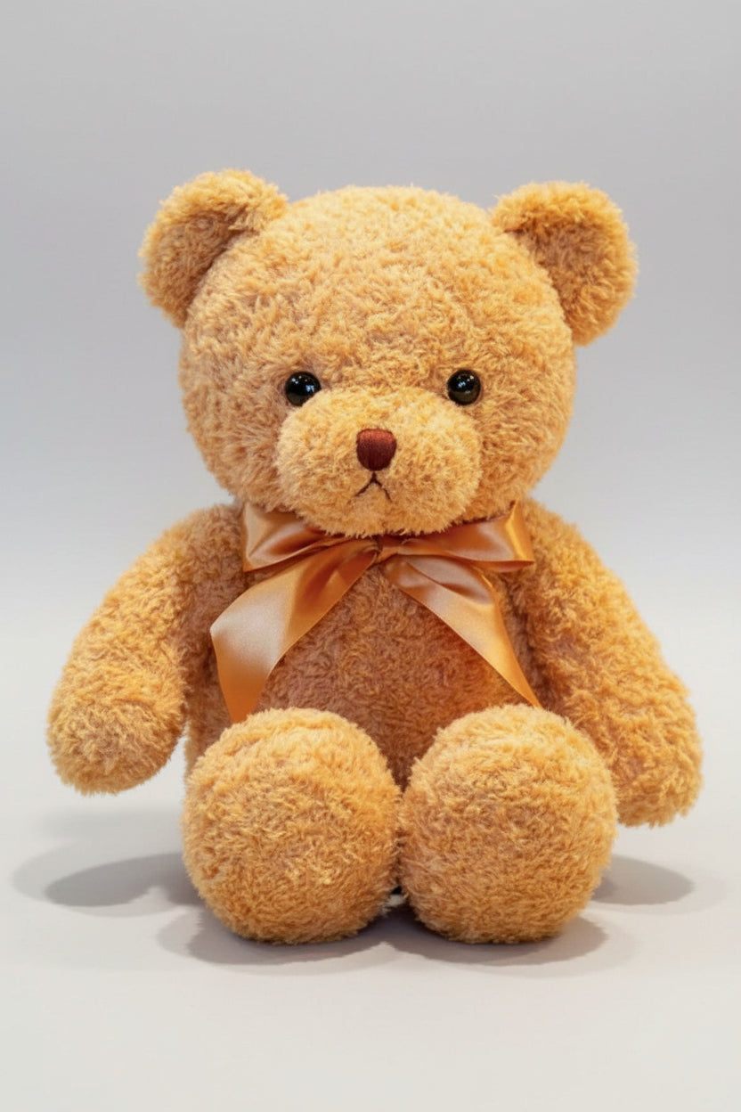 Plush teddy bear with a bow tie