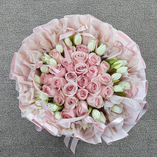 Bouquet of pink roses  and Tulips