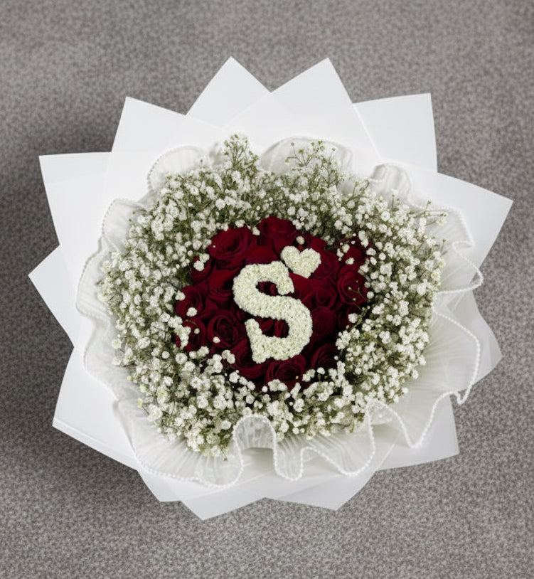 Vancouver Floral arrangement with red roses and baby's breath 