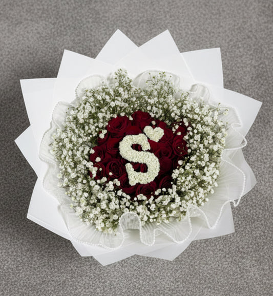 Vancouver Floral arrangement with red roses and baby's breath 