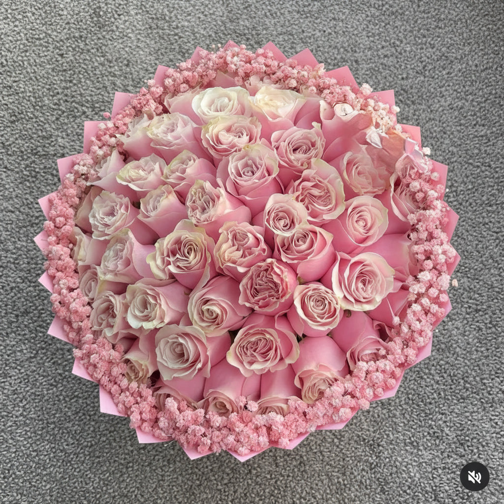 Bouquet of pink roses with pink wraps