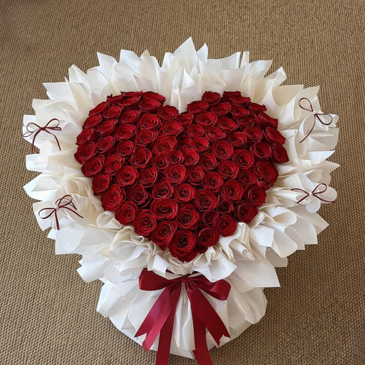 Fluffy Heart-shaped arrangement of red roses